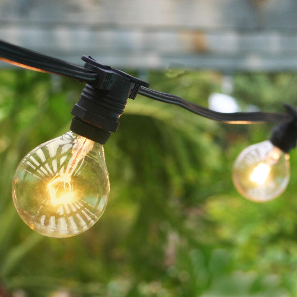 50 Socket Weatherproof Outdoor Commercial String Light Set, Clear Globe Bulbs, 54 FT Black Cord w/ E12 C7 Base, Weatherproof - Luna Bazaar | Boho &amp; Vintage Style Decor