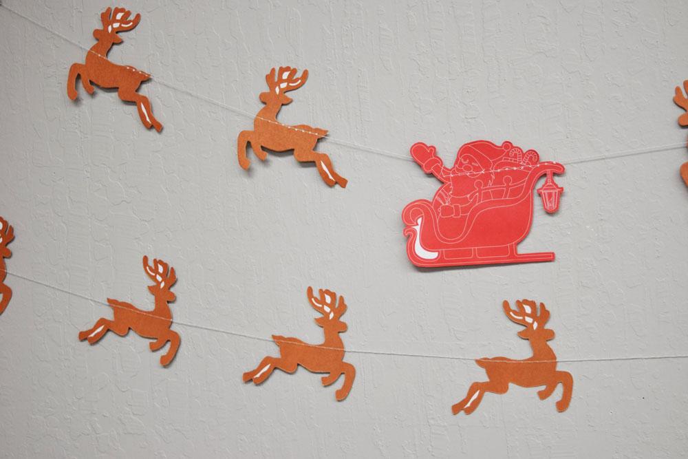 CLOSEOUT Red / Brown Santa&#39;s Reindeer Sleigh Christmas Holiday Party Paper Garland Banner (11FT) - Luna Bazaar | Boho &amp; Vintage Style Decor