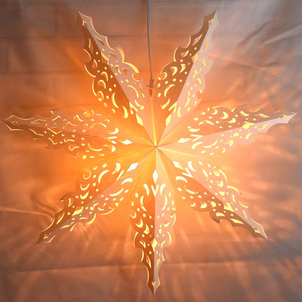 https://www.lunabazaar.com/cdn/shop/products/winter-snowflake-paper-star-lantern-north-star-image-1_0f2c5449-0fdb-4a9d-a36b-b66c4eefc09e_1200x.jpg?v=1636045988